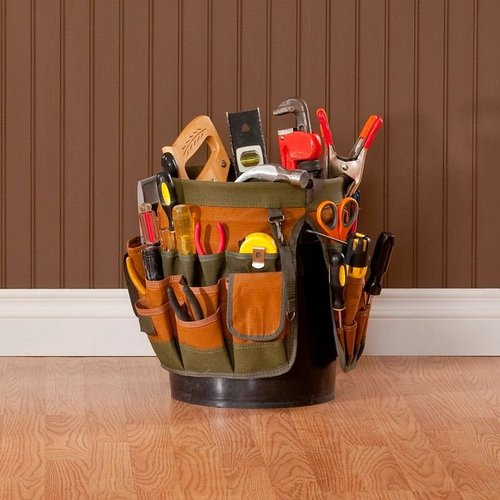 Bucket of Flooring Installation Tools From Walnut Carpet | 16790 East Johnson Drive, El Monte, California 91745